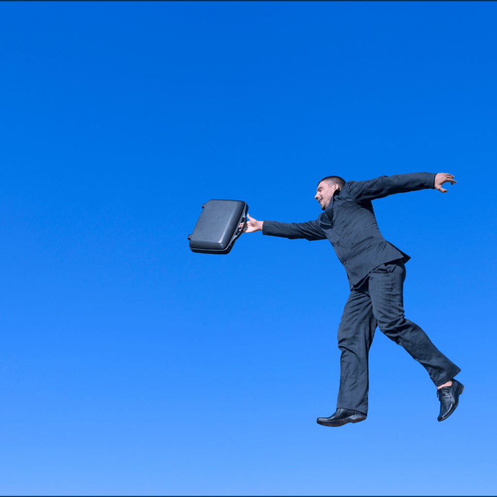 Business man jumping from ledge - Stop Playing It Safe: Aggressive Business Borrowing Strategies to Become Unforgettable 